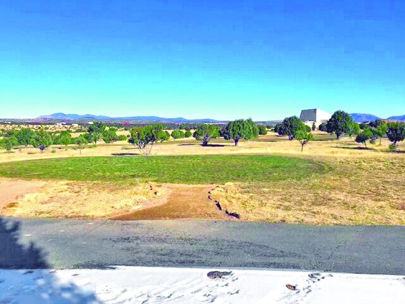 Property in Ruidoso — photo as printed in The Real Estate Roundup