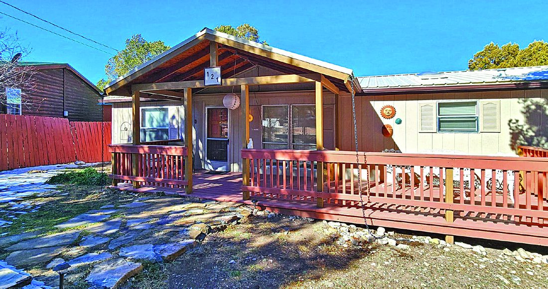 2 Bedroom Property — photo as printed in The Real Estate Roundup