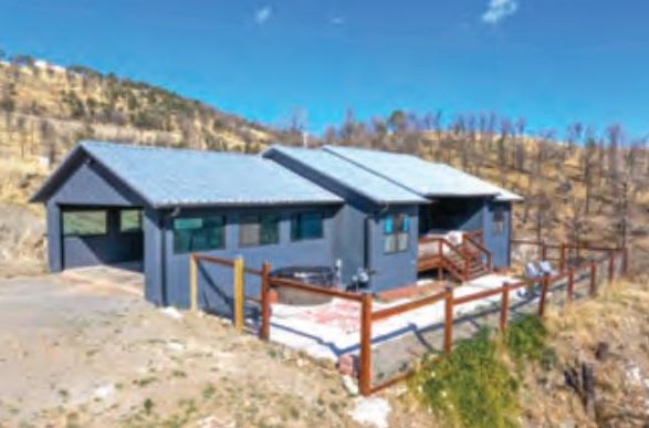 Property in Ruidoso — photo as printed in The Real Estate Roundup