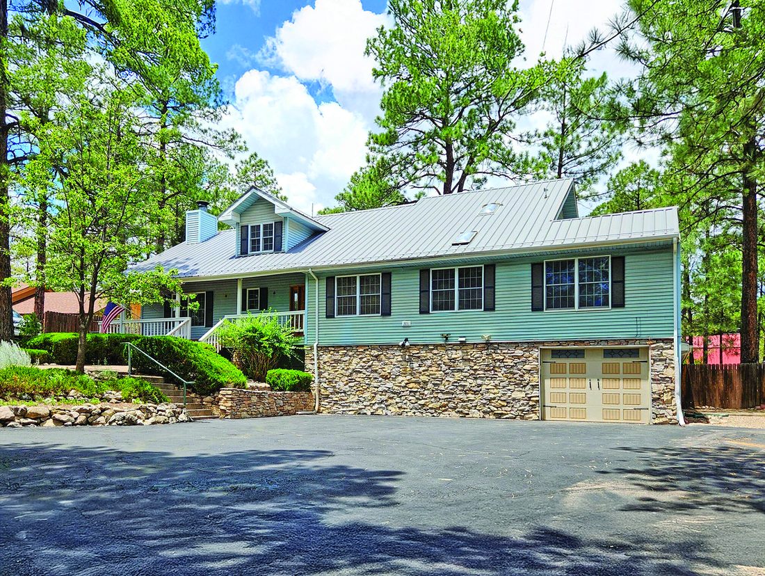 4 Bedroom Property — photo as printed in The Real Estate Roundup