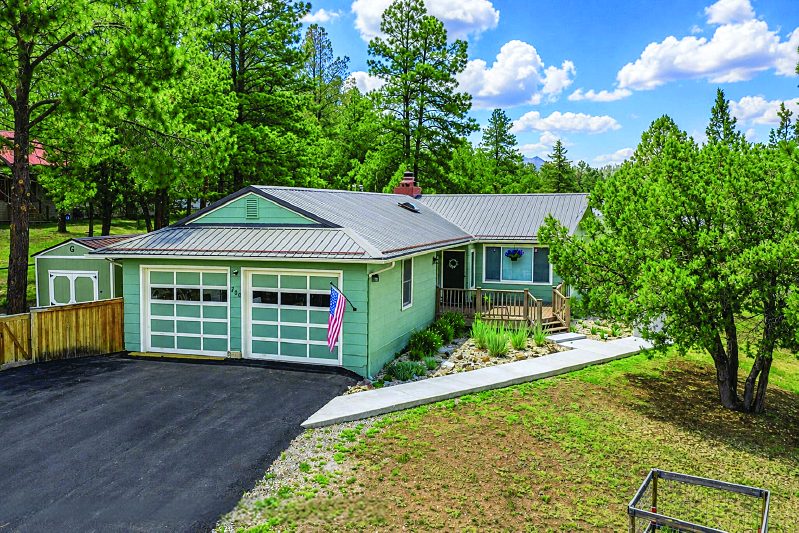 108 Sarah Lane — photo as printed in The Real Estate Roundup