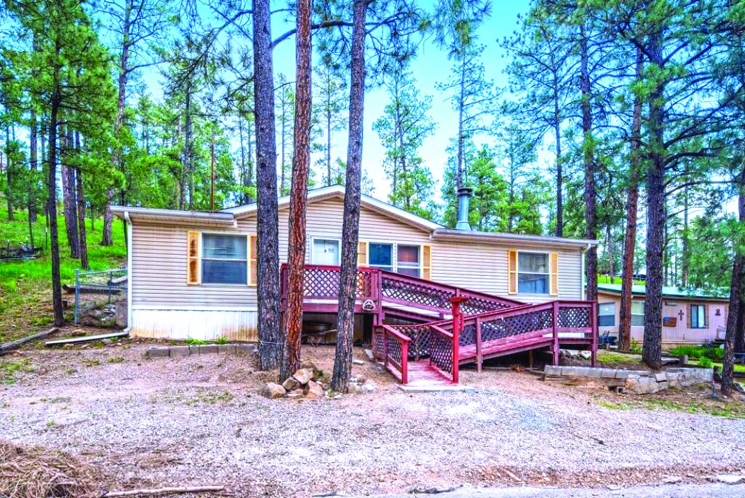 Property in Ruidoso — photo as printed in The Real Estate Roundup