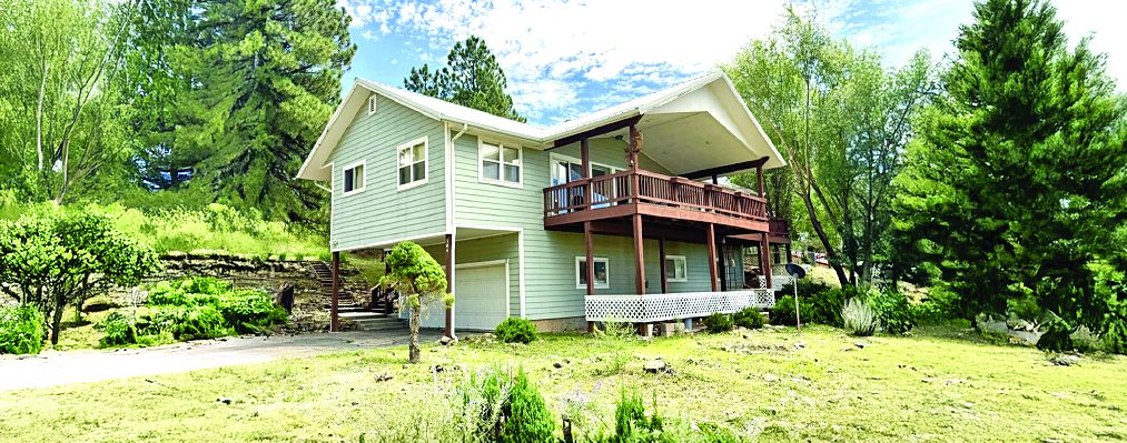 Property — photo as printed in The Real Estate Roundup