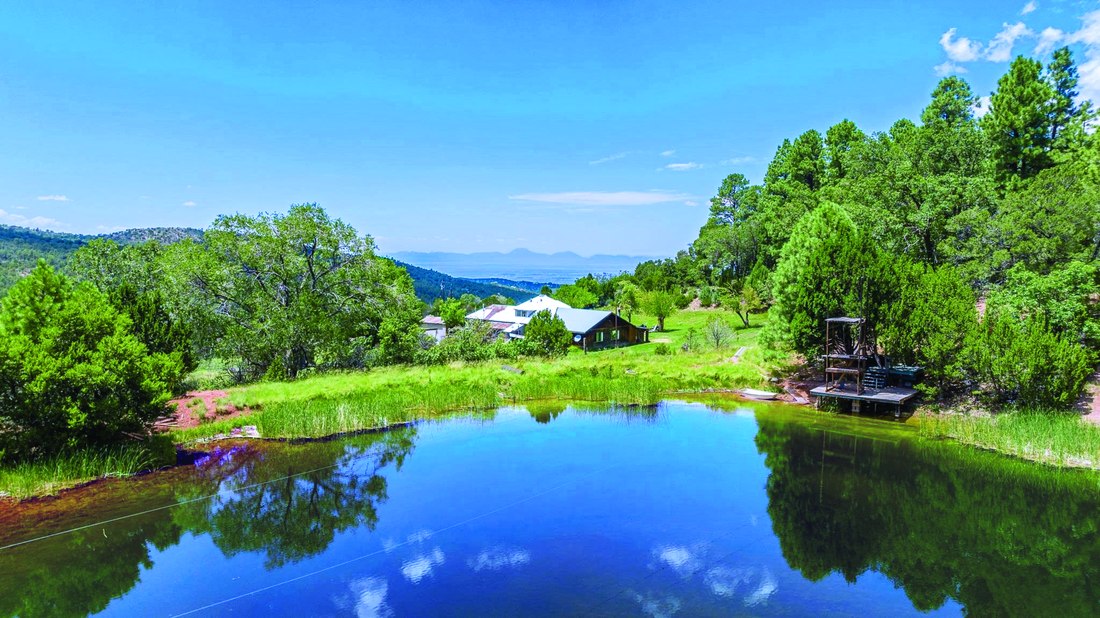 163 Karr Canyon Rd — photo as printed in The Real Estate Roundup