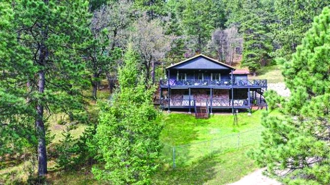 46 Wimsatt Loop — photo as printed in The Real Estate Roundup