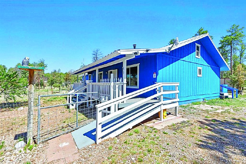 83 Dry Creek Dr, Timberon NM — photo as printed in The Real Estate Roundup