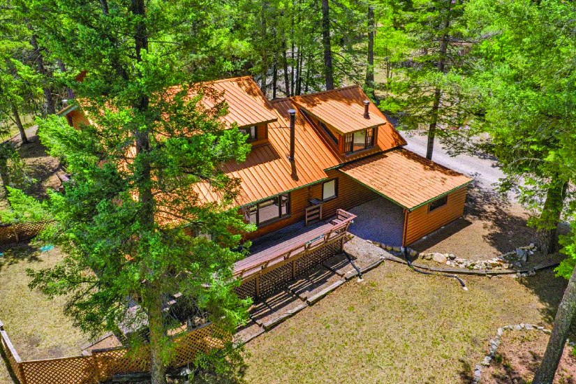 4 Bedroom Property — photo as printed in The Real Estate Roundup