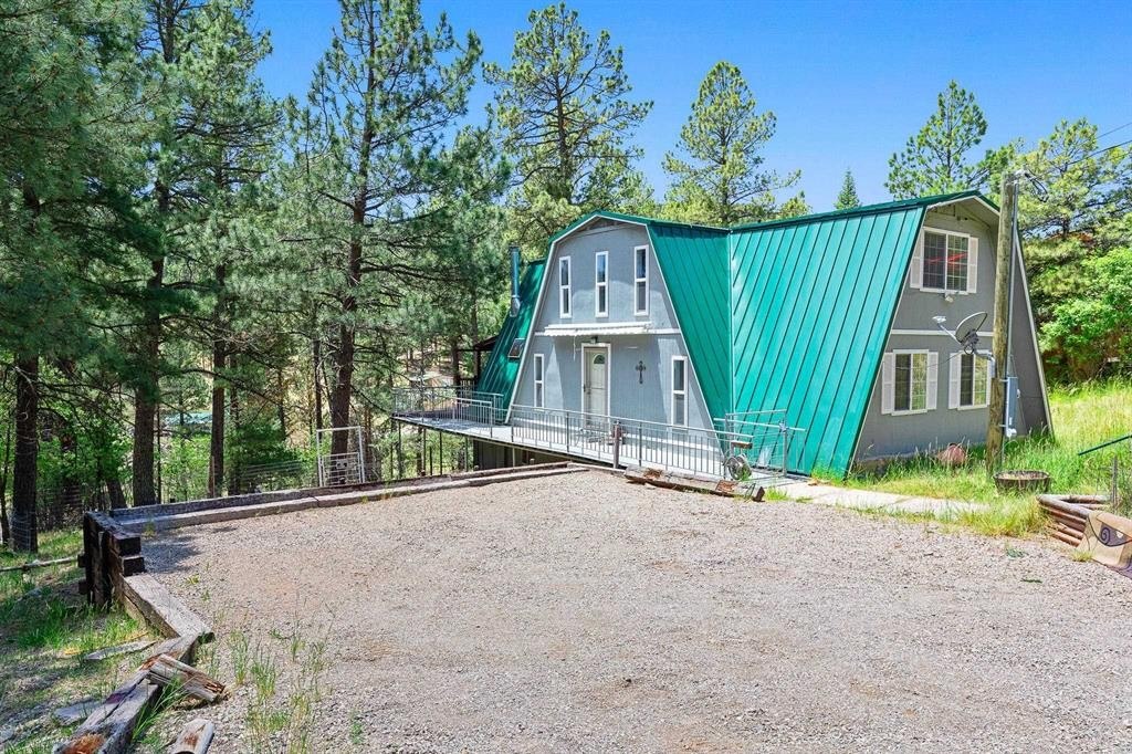 2 S Groesbeek Rd Cloudcroft NM — photo as printed in The Real Estate Roundup