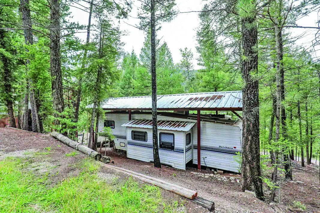 12 Wildwood Loop Cloudcroft: — photo as printed in The Real Estate Roundup