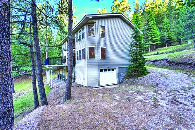 15 Plug Nickle Rd — photo as printed in The Real Estate Roundup